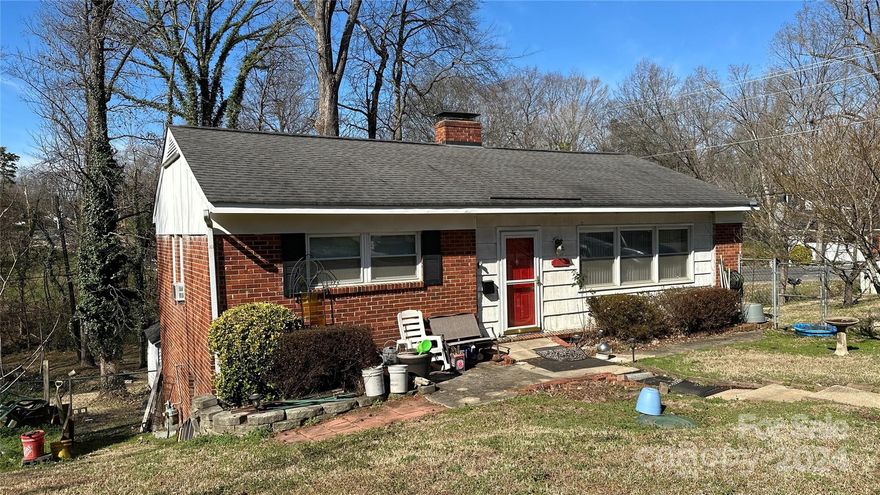 Large corner lot in very sought-after Selwyn Park that backs up to a creek and wooded area. 4 mins from Park Road shopping center. The house is the perfect redevelopment opportunity in a HOT Neighborhood! Brand new HVAC system. The house is being sold in as-is condition.
