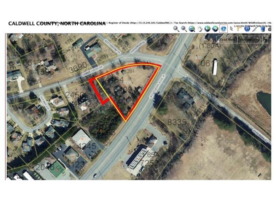 Ready for business!  Vacant Lenoir corner lot zoned B-2 on Highway 18 (Wilkesboro Blvd) with nearly 300 feet road frontage on Hwy 18.  One and 3/4 Mile from Smith Crossroads at US Highway 321, the region's busiest intersection and corridor.  Site also located less than 1/4 mile from Hibriten High School entrance.  City water and sewer available with tap fees.  Also served by Duke Energy and Piedmont Gas.  Site mostly cleared and relatively flat.

Excellent for convenience store, business professional site or retail service location.