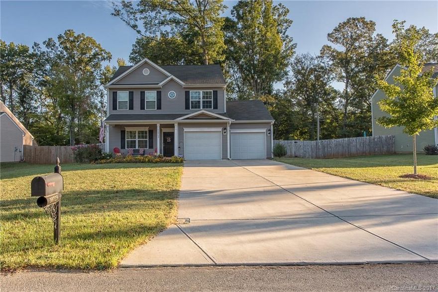 Move In Ready home shows like a model! Upgraded wood floors throughout first floor and upstairs hallway. Kitchen with granite, upgraded 42 in cabinets, and stainless appliances.  Large Master suite with trey ceiling, walk in closet and private bath with double sinks, & oversized shower. Enjoy local festivals and farmers market with easy access to downtown Matthews. Convenient to Hwy 74, Hwy 51, Sycamore Commons and Windsor Square shopping centers.