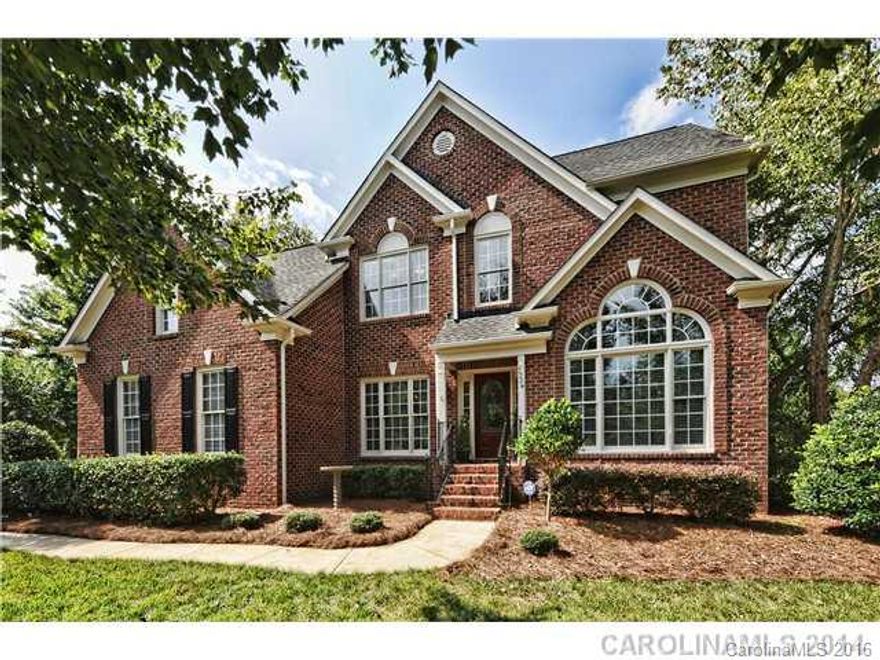 Quality in Every Detail! Full Brick, Master on Main, Open Floorplan, Hardwoods, & Soaring Ceilings! Incredibly Upgraded Master Bath has Frameless Glass Shower, Soaking Tub, Mahogany Vanity & Etagere, Walker-Zanger Marble, & Schonbek Chandelier! Updated Guest Bath!  Updated HVAC, Updated SS appliances, Updated Composite Deck, Newer Roof, Professionally Landscaped Fenced Yard! A Must See!!