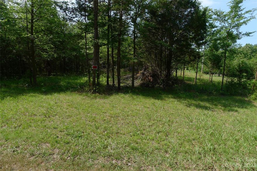 4+ acres on a private road. See attached soil evaluation. Land allows Singlwides, Doublewides, on frame modulars, off frame modulars, and site built homes.