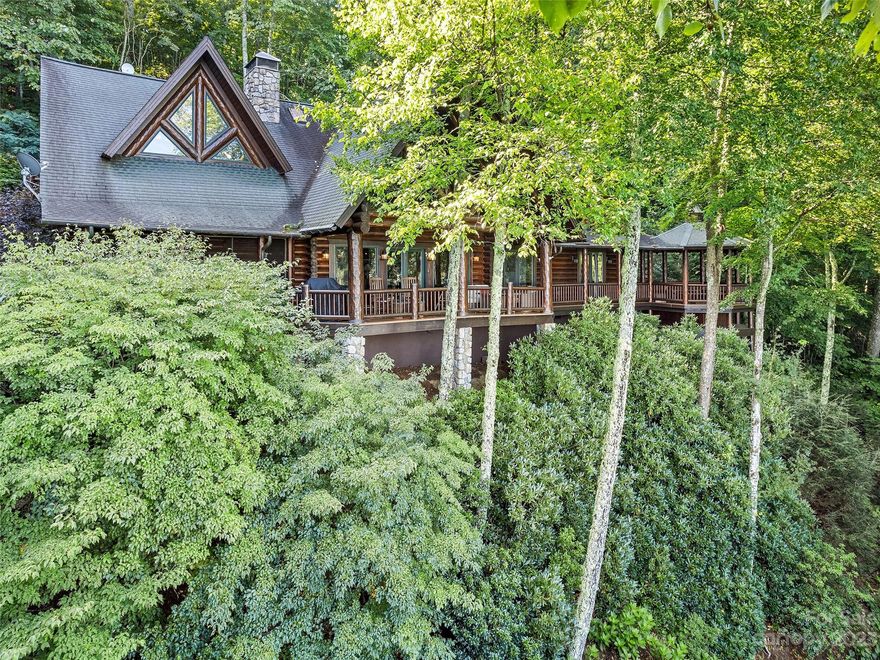 Beautiful log home with authentic Hiawatha large logs located in the Smoky Mountain Retreat at Eagle's Nest. Excellent long distance views. Enjoy the outdoor living area at this high elevation home. The home includes 10" full red pine hand-hewn logs. Great room with 35' stone fireplace. Open floorplan. Hot tub. Most of the furniture is included excluding the artwork and accessories.