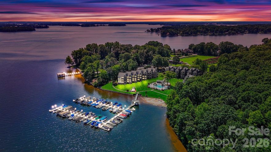 Slice of paradise on Lake Norman! This RARE 3-bedroom, first-floor lakefront condo offers breathtaking views of the water, community pool, and swaying palm trees. Enjoy effortless lake living with deeded boat slip #24 just steps from your door, located within the Hide A Way Yacht Club. Inside, you’ll find new LVP flooring, fresh neutral paint, a new water heater, and beautifully refinished butcher block countertops.

The well-maintained community features a fire pit, community garden, tennis and pickleball courts, and an open field perfect for pets. HOA includes cable and internet, making this an ideal low-maintenance retreat or investment opportunity. Long-term rentals (6+ months) are allowed. Relax, unwind, and live the lake life you’ve been dreaming of!