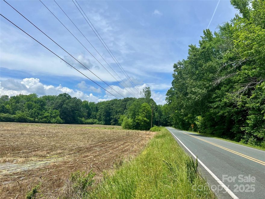This 16.7± acre parcel located on Providence Road in Waxhaw, NC, offers a mix of open space and natural features ideal for recreational use. The property includes an estimated 8-acre field suitable for various outdoor activities, while a scenic creek runs along the rear boundary. With all but approximately 0.2 acres situated within the floodplain, the land is best suited for uses such as hunting, farming, or other non-residential recreational purposes. Property is located in a desirable area with easy access to Waxhaw and surrounding communities. Floodplain status may limit building potential; buyer to verify all intended uses with the appropriate local agencies.