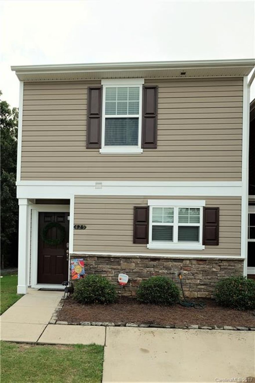 Beautiful three bedroom end unit town home in Catawba Village. Large open floor plan. Spacious kitchen w/stainless steel appliances and walk in pantry. Master suite upstairs with full bath. Two additional bedrooms with full bath and laundry also located on second floor. Private patio overlooking wooded nature trail. Outdoor storage room. Neighborhood amenities include clubhouse and beautifully landscaped pool.