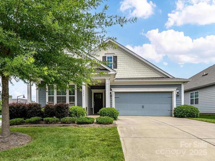 Discover your dream home in the highly sought-after Cypress Point community! This stunning ranch features inviting covered front & back porches, perfect for enjoying the outdoors. The thoughtfully designed split bedroom floor plan includes two cozy bedrooms sharing a hall bath in addition to a luxurious primary suite complete with 2 spacious walk-in closets. Indulge in the primary bath's elegant granite counters, double sink vanity, & a walk-in shower with a glass door. New carpet in all bedrooms 5/2025. The expansive kitchen boasts granite countertops, an island ideal for seating, subway tile backsplash, & modern appliances including a gas range, microwave, d/w & refrigerator. The family room & dining area create a warm atmosphere w/a gas fireplace, ceiling fan, & window blinds for added comfort. With a convenient two-car garage & ample outdoor space, this home is a perfect blend of style and functionality. Enjoy Cypress Point amenities, nearby marina & shopping/dining options