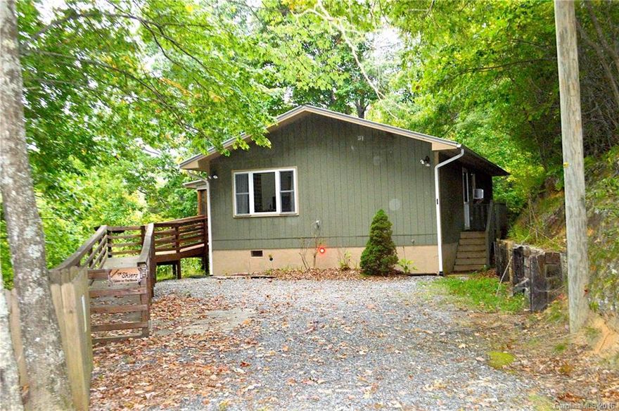 Clean, private, & Stylish Cabin with 2 large master suites with en suite baths... floor to ceiling windows in living area.. Propane gas free standing fireplace... screened porch for outdoor living with a Mountain View... wooded Privacy - can not see another house... on vacation rentals - available furnished $1,500. Paved roads.. central heat & window AC. Check off a lot of wish list boxes. Parking wheelchair ramp & shower/bath are handicap friendly -easy access for all ages and/or handicap...