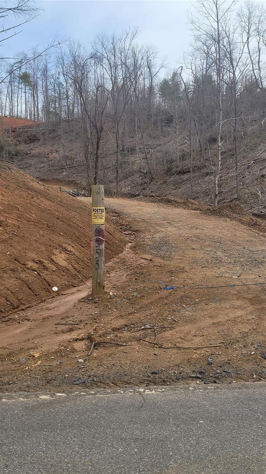 Looking for that private property to build your dream home on? Look no further. This 19.28 tract has just been timbered and has good roads and several exceptional building sites along with a 3 bed room perc on file. The views are more than you could ever imagine. About 20 minutes to DT Asheville but in the country for that peace and quiet you are looking for. Room for pasture, gardens, and animals.