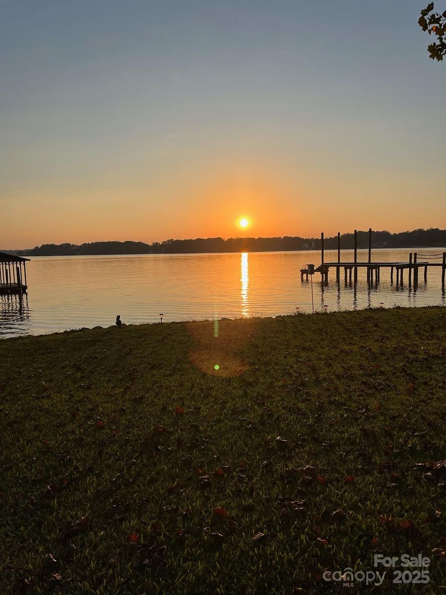 Beautiful sunsets! Build your dream home in this very private community.  You will enjoy stunning west and southwest views from this main channel waterfront lot.  This is a deep-water lot featuring 0.81 acres with existing permitted pier and floating dock with approximately 200 feet of shoreline with riprap already in place, and no HOA. Being sold primarily for the value of the lot although there is a small cottage that can be torn down to make room for your dream home on a fabulous waterfront lot!  The surrounding homes are consistent with high-end waterfront homes in the area.