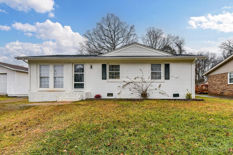 Full Brick, Updated, 3 Bedroom, 2 Bath Home plus large flex room! Fenced back yard, located in community with NO HOA! Exterior brick painted white. Open floorplan with new LVP flooring throughout. Seller upgraded Kitchen to quartz counters, island with seating, 36" cabinetry & lighting! Flex Room (currently used as office) has patio access. Spacious Primary Bedroom with ceiling fan/light & LVP floors! Secondary Bedrooms with LVP floors! Updated Plumbing throughout! Large, Covered Patio added by seller in 2022! Shed & Storage Building on property to remain with Buyer! Tankless water heater replaced 2023! Roof replaced in 2022! Conveniently located just off I485 close to Whitewater Center, Charlotte Douglas Airport, restaurants and shopping!