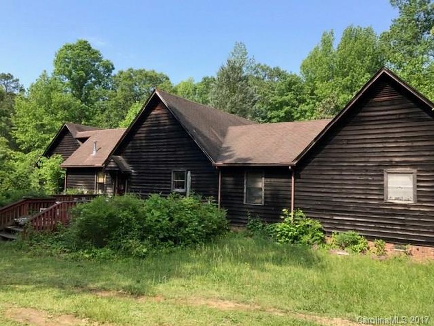 Large 3 bedroom home on private wooded 3.61 acre lot. Home has a detached oversized garage/workshop. Vaulted ceilings in living room and kitchen. If your looking for privacy this home is for you.