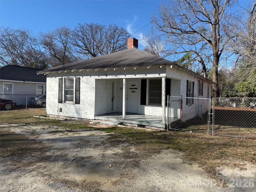 This home is affordable & waiting on a buyer!  It's a 2 bedroom w/  1 bath, (tub/shower combo).  It would make a great rental for an investor or a homeowner looking for something affordable.  It's close to town, the grocery store, the post office, the convenience store, the dentist, etc. .....Just a short walk to town, in fact.   The floors are hardwood throughout, except the bath & kitchen.  COME CHECK IT OUT!