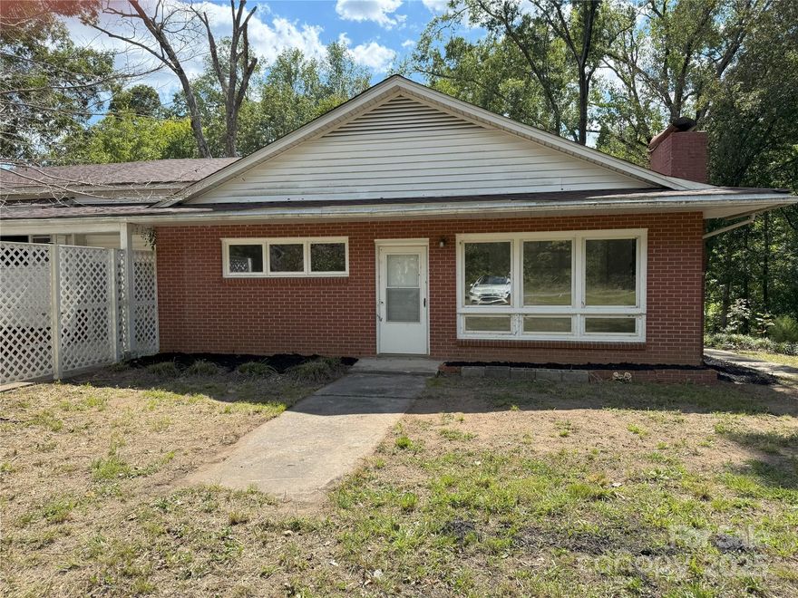 Investor's Opportunity. Home is being sold as is. A little over 2 acres, this property is perfect for an investor looking for rental property. There are two duplex units, each on separate meters. Current owner/investor is selling due to distance and the lack of time to manage. The home has been vacant for over a year. New well was installed but due to water not running a well test came back with 2 issues - report attached. Portions of the electrical system have been repaired or replaced due to theft of copper as well as plumbing. There is new flooring and interior paint. Roof was replaced 4 years ago.
Seller is a licensed NC/SC real estate agent