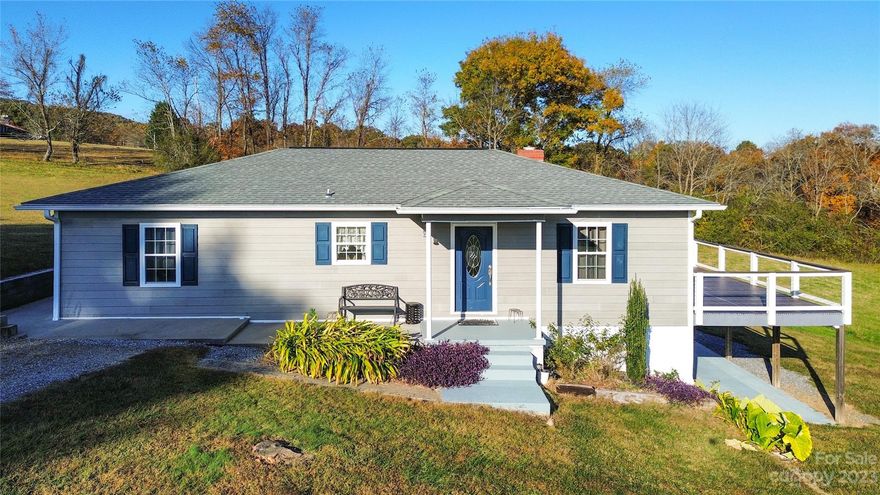 Located in this highly sought-after area of Marion, this updated home boasts exceptional quality throughout and is situated on over 7 acres of scenic and functional land. Soak in the Mountain views while relaxing on the deck. This incredible home features a bright and welcoming layout, as well as a basement with a separate entrance that is ideal for second living quarters. In addition, the expansive property offers a large detached garage with electric & air compression, making it a dream workshop! Embrace the serene atmosphere that this remarkable property offers, and schedule a visit today!