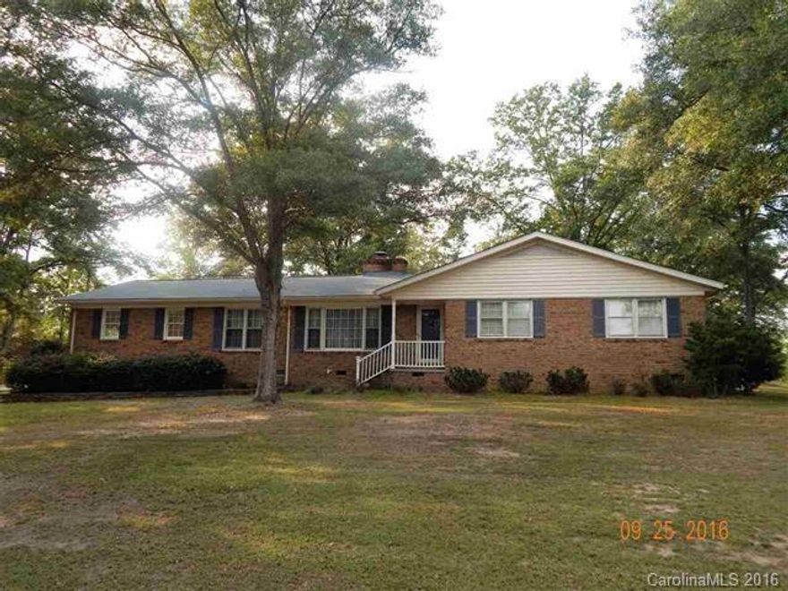 Lovely custom built pet free brick home has its original owner. 3 bedrooms, 2 baths, one bath w/wall of cabinets with built in clothes hamper, laundry room w/sink, cabinets & place for freezer, updated kitchen w/ breakfast area, living room/dining combo den w/ gas log fireplace and built-ins. You won't find a
home with this much storage anywhere. Hardwoods under carpet in bedrooms, hall, living room/dining room. Double garage/with storage room. 24x12 wired building 1.62 acres in Elgin community