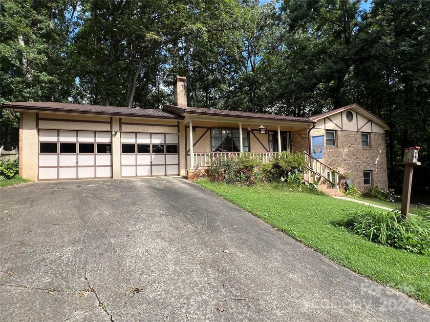 WELL-MAINTAINED one-owner brick/hard stucco home with 3 bedrooms, 2 baths located in the Salem community. Family room features bay window allowing natural light, built-ins with wood burning fireplace. Open dining/eat-in kitchen area with breakfast bar leads to a patio and level wooded backyard. Primary bedroom with en-suite bathroom. Two additional bedrooms and hall bath. Finished bonus room and 1/2 bath in the basement not included in the HSF due to drop ceilings being just under 7'. Unfinished area for ample storage. Two car garage has utility room with laundry area. Metal roof with gutter guards replaced in 2019. HP 2019. Some replacement windows. Brentwood Water Corp. Burke Co. has no info on septic.