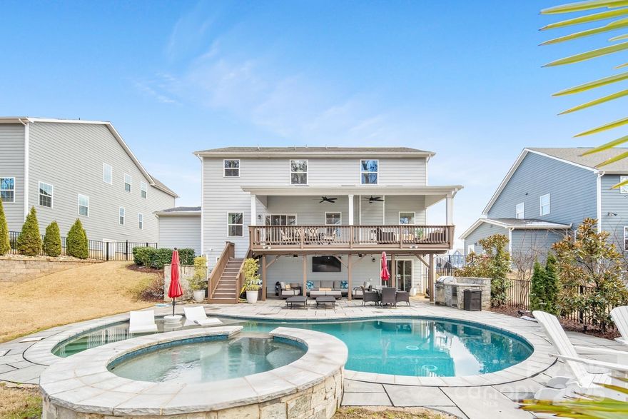 Agents: Show for BACK UP!Nestled in a prime Davidson location w/ easy access to downtown and the Greenway, this stunning home offers luxury living w/ a thoughtful layout & exceptional features. This 2-story home w/ a basement boasts an open floorplan, high-end finishes, & abundant natural light. The main level features a spacious family room w/ a gas log fireplace, gourmet kitchen with an oversized island, walk-in pantry, premium appliances, a formal dining room, & a mudroom. Upstairs, the primary suite impresses w/ a spa-like bath & large walk-in closet, plus additional bedrooms, a full bath, loft, and upper-level laundry. The finished basement offers extra entertainment space w/ a rec room, full bar, & bath. Outside leads to a backyard retreat with an in-ground pool, hot tub, outdoor kitchen, firepit, & multiple covered outdoor spaces. Additional highlights include a 3-car garage, fenced yard, and tankless water heater. Don’t miss this incredible opportunity—schedule a showing today!