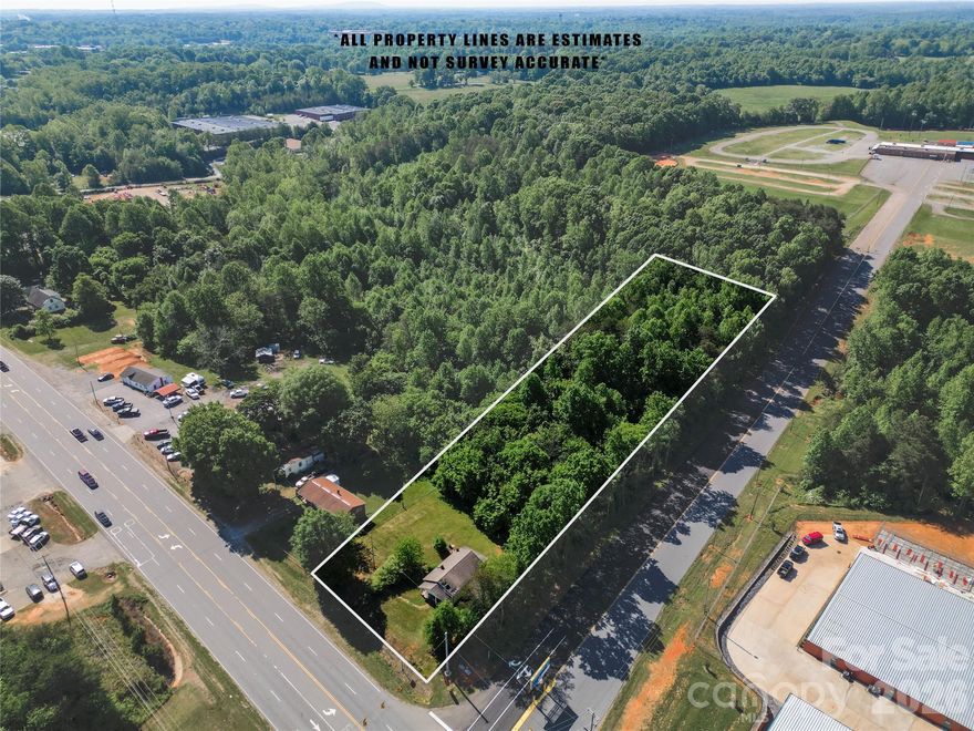 1.45 Acres | Signalized Corner Lot | B-2 Zoning | Newton, NC

1.45-acre corner parcel located at a signalized intersection in Newton’s B-2 Highway Business District, offering strong visibility and access within an established commercial area.

The property consists of two combined parcels and is situated across from an industrial park, warehouse and storage facilities, and the county fairgrounds, contributing to consistent area traffic.

Public water and sewer are available at the road.

Per B-2 zoning, the property may be suitable for a variety of uses, including:

Retail or multi-tenant commercial development
Restaurants, including drive-thru (buyer to verify)
Gas station or convenience store
Office or medical use
Lodging or hotel
Residential uses such as multifamily, duplex, or single-family (buyer to verify)

Corner location with dual road frontage provides multiple access points and visibility.

Buyer to verify all zoning, permitted uses, utilities, and development requirements.