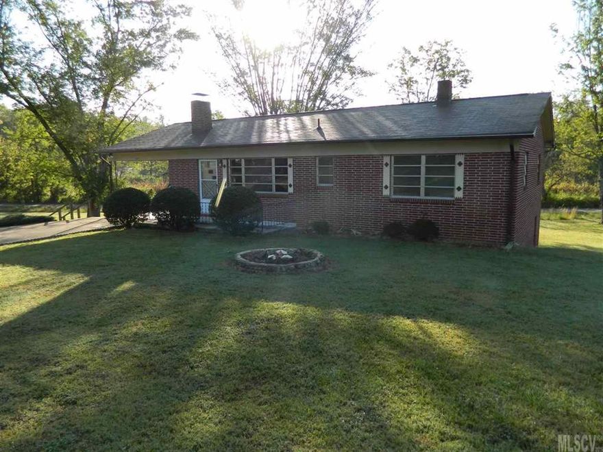 Brick ranch with full basement, 3 bedrooms, 1.5 baths located in Lower Creek. Home features hardwood floors under the carpeting, wood burning fire place, attached single carport and single garage in basement. Level yard for recreation and gardening. Conveniently located close to Lenoir walking park, schools and shopping.