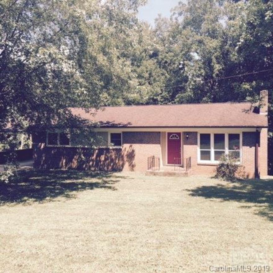 Wonderful ranch home in Drexel area on 5.08 acres on dead end street. The perfect place to raise your family!!  Home features living room with fireplace, updated kitchen with cherry cabinets and granite tops /dining area with new flooring, three bedrooms , 1 bath, full basement with room for expansion and is plumbed for bath also has garage door, and single carport.