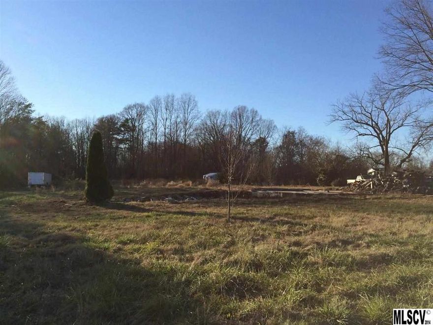 Great building lot near the entrance of Granada Farms. This lot previously had a house on it that burned down. Garage Slab, driveway and septic system still in tact.