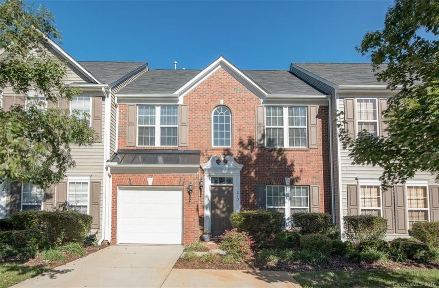 Beautiful townhome with new flooring, paint, light fixtures, granite & dishwasher! Bring your pickiest buyers; they will not be disappointed! Open floorplan on main level with bright sunroom & vaulted ceiling, flowing out to private patio area. This move in ready home has a spacious garage and extra parking pad. The dining and master bedroom have tray ceilings. All bedrooms have ceiling fans and Master Suite comes complete with walk-in closets, spacious vanity, garden tub and shower.