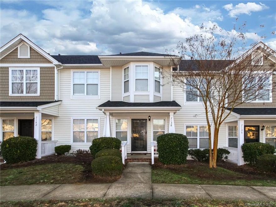 Immaculate townhome in a location close to shopping, dining, entertainment, and the interstate. Charming front porch, hardwoods on main, open floor plan, stainless appliances in kitchen, master bedroom with sitting nook and bay window, dual sinks in master, spacious secondary bedroom. Attached 1 car garage.  Fresh paint and move-in ready!