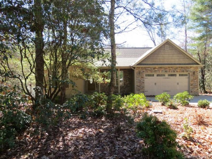 End of cul-de-sac privacy with additional Land Conservancy acreage behind. This well designed home features  hardwood floors/ spacious Great Room with Huge Stone Fireplace/ and Cathedral Ceiling with skylights. The  Kitchen has upgraded stainless appliances, granite countertops and an eat-in area that leads to the outdoor screened in porch. There is a formal Dining Room, Master Bedroom with two walk-in closets and tray ceilings. LL has Family Room/Office/Bath/storage.Buyer pays $8000 amenity Fee