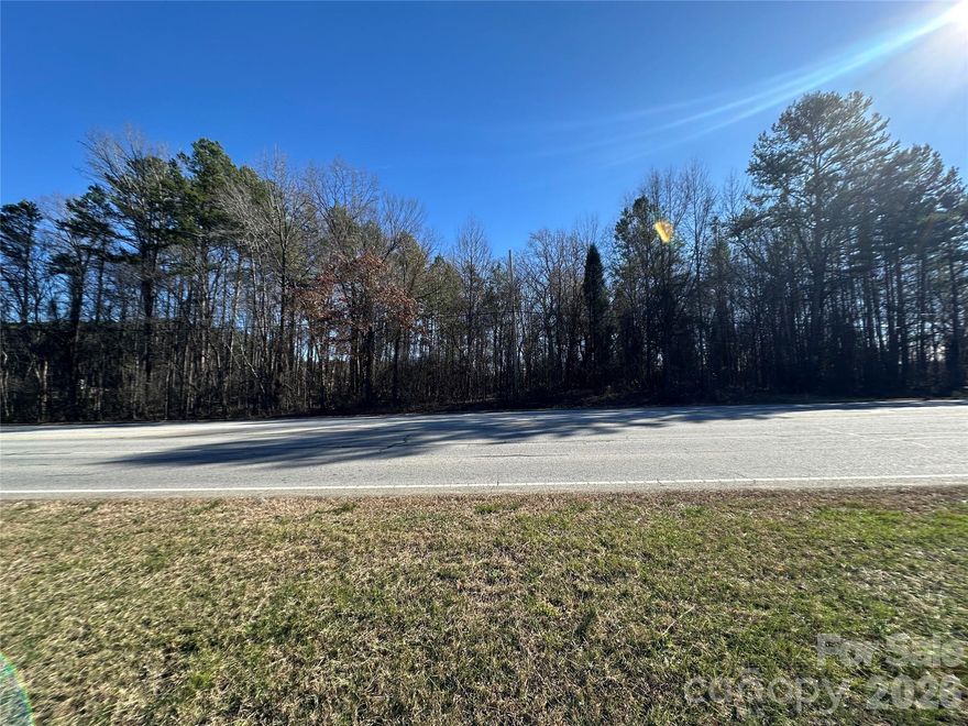 1.94 acres with 405' of highway frontage, zoned CBI - Commercial Business Industrial, which allows the broadest number of uses.  Traffic count roughly 11,500 vehicles per day.  Easy interstate & air port access.   City water service available.  Lightly wooded Relatively flat lot located in growing area of NC.  Recently completed Macy's fulfillment center employing 3,000 people nearby.  Located half way between Charlotte NC & Greensboro NC also close to Kannapolis & Mooresville NC.