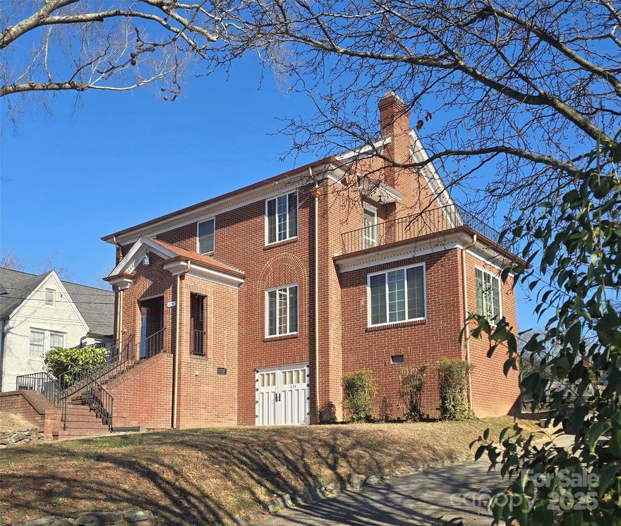 This well-built 1930s house exudes historic charm and is a true head-turner. With its solid construction and spacious interior, it was built to last. True craftsmanship is evident in the exterior brickwork, dental molding, and trim. Oil-rubbed hardwoods adorn the entire house, except for the kitchen and bathrooms, which are tile. A curved plaster ceiling, entry foyer, and descending staircase create a grand ambiance. Custom wainscoting, chair rail, original built-in cabinets, and cedar-lined closets add to the home’s charm. The formal living room features a fireplace that leads to a three-sided glass sunroom. The formal dining room connects to the breakfast room, which has a built-in butlers pantry and an updated kitchen with classic black and white tile and a walk-in pantry. The main level includes a bedroom/office and a bathroom. An extra-wide staircase leads to a large landing and four bedrooms, and a pull down staircase opens up to a large expandable attic. The front right bedroom has access to a rooftop terrace. The basement features a workshop, laundry area, and a half-bathroom. The rear patio and partially fenced yard provide outdoor living space. The home has a hybrid HVAC system, with the main level heating and the upper level using a heat pump. The roof and gutters were replaced in 2013. Energy-efficient windows have also been installed. This home is conveniently located just a short distance from downtown businesses, restaurants, and the new Pfeiffer Campus.