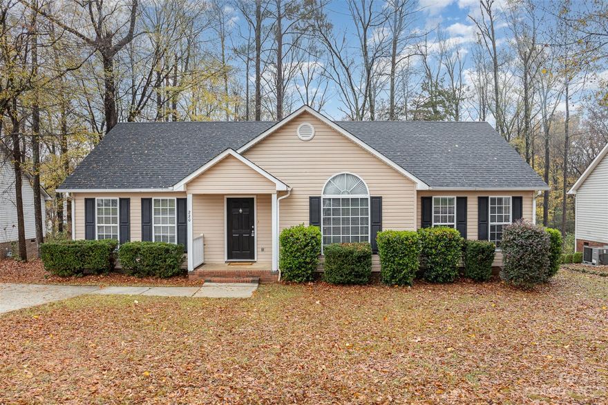 Brand new roof and freshly repainted! This 3 bed, 2 bath ranch home on a large private lot! You'll love the vaulted ceilings as you walk in, as well the beautiful hardwood floors and cozy gas fireplace. The living room flows into the dining area and kitchen with durable  engineered hardwoods, newly installed granite countertops, and brushed nickel fixtures.  The large primary bedroom suite has a tray ceiling and large bathroom with dual vanity sinks, as well as a walk in closet.  The 2 additional bedrooms are spacious and share an additional bathroom. Tile floors have been added in both bathrooms as well as the spacious laundry room. The large deck out back is perfect for hosting cook outs and backs up to woods that add privacy.  Don't miss this move in ready home!!