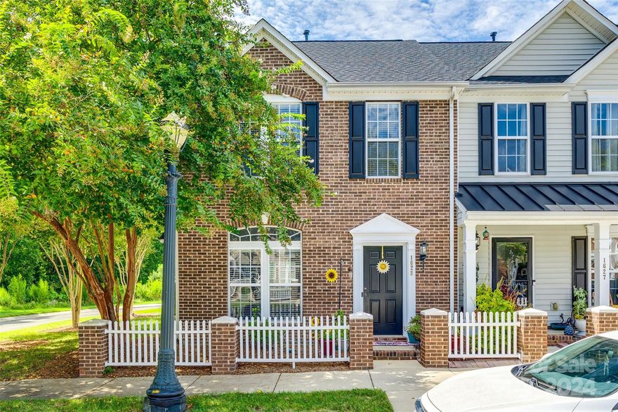 This stunning townhome has it all! Nestled in a highly sought-after community, this rare 3-bedroom gem features a sunroom and is situated in a private location with no other townhomes facing the rear. As you enter the neighborhood, you'll be greeted by charming tree-lined streets and picket fences, with sidewalks and streetlamps. Inside, the first floor boasts 9 ft. ceilings, a beautifully updated kitchen with Travertine Tile flooring,ceramic tile backsplash, and granite countertops. Refrigerator, washer and dryer stay! The main level also features elegant LVP flooring. All 3 bedrooms are on the second floor, with the primary suite featuring a tray ceiling, walk-in closet, and updated bathroom. Conveniently located minutes from I-77, shopping and dining. Don't miss the opportunity to see this immaculately kept end-unit townhome, and one of the largest in Manchester Village.