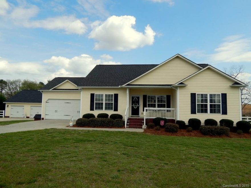 Charming home on over 6 acres. Take a walk to the pond, and fish from the dock! Grab a rocking chair on the front porch and take in the quiet, open view. Relax with family and friends on the screened in porch and patio overlooking the private, fenced back yard. Vaulted ceilings in the great room, tray ceiling in the master bedroom, split bedroom plan, large breakfast area, wood floors, and 2 garages are a few things this southern home has to offer. Come inside to see the rest!