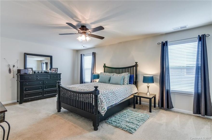Spacious home in The Farm at Riverpointe. Kitchen features Granite counters and breakfast bar that opens to a Morning room overlooking the huge fenced in backyard with play structure. Large Master bedroom and bath with separate garden tub and shower. 3 additional large bedrooms upstairs and a laundry room! Community features resort like amenities, Clubhouse, Pool with kiddie area, Volleyball Basketball and Tennis courts, fitness center and playground!