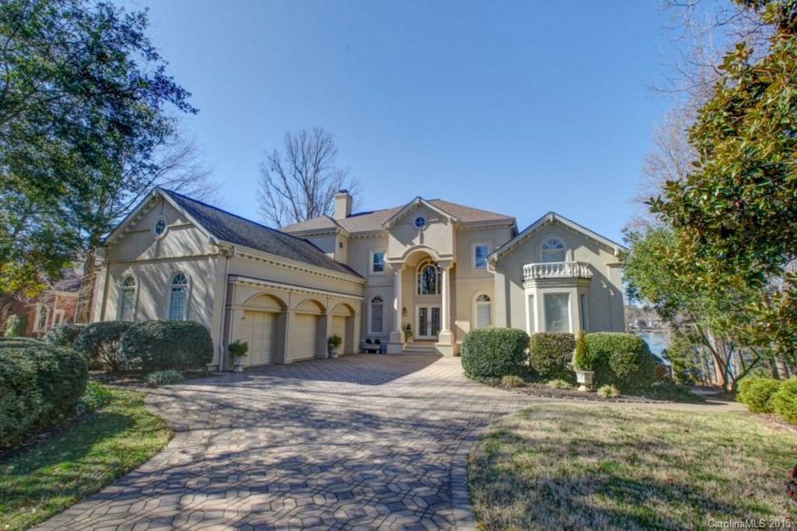 Waterfront, sunset views. Lrg sandy beach. Own dock/boat lift. Cul-de-Sac. Soaring ceilings up to 25ft.  2fpl.  2 screened porches, 3 verandas. Whole hse sound system.  Reduced cost Peninsula Club membership avail. Refinished kitchen cabinets & wood flrs. Mstr suites on 1st & 2nd. His/her custom closets 1st fl mstr.  Paver driveway. 3+ car gar w/ 34 storage cabinets & xtra wide center door for easy access. Lake level walkout w/ bar, 110" projection scrn & wrkshop/utility gar. Security syst.