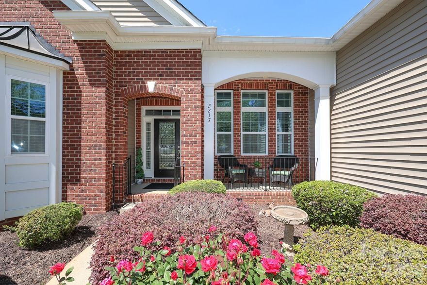 Chapel Gate is a gated community.  This ranch home features 3 bedrooms on the main and has an finished bedroom or bonus with closet and half bath over the garage.  Upon entering this well-maintained home the dining area to the right has a coffered ceiling, the room to the left has french doors and can be used as an office, study or flex area.  The large vaulted family room has gas logs and a cozy fireplace and is also wired for surround sound as well as built-in bookcases. Lots of upgrades featuring crown molding, upgraded hardware and much more. The kitchen has granite countertops, black granite double sink, under cabinet lighting, cherry cabinets, and a walk-in pantry.  This is a split bedroom plan with the primary bedroom featuring lots of windows and  a large walk-in closet -  En Suite with garden tub; double vanities (comfort height), separate water closet and marble slab wall shower). Flooring is engineered hardwood, tile and carpet. Plenty of natural lights comes into the home. The screened-in porch and deck overlooks private wooded backyard.  Natural gas outlet installed for grilling. Extra electrical outlets installed.The gutters have leaf protection. The home is wired with alarm system. Two-car side load garage and sink installed in garage. Show this home and it will sell itself. See tour: https://catch-light-studio.seehouseat.com/2381458?idx=1