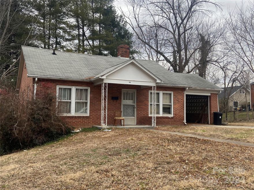 Excellent opportunity with this 2BR 1Bath brick cottage within walking distance of downtown. Home does need some TLC but per seller has hardwood floors under carpet and could be a great primary residence or income producing rental property. Single carport and partial basement. Must see at $149,500