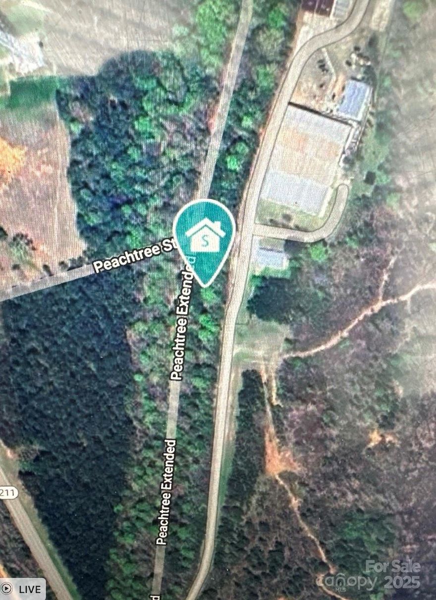 Discover the charm of rural living on this beautiful 4.71-acre tract nestled along Peachtree Rd in peaceful Hickory Grove, SC. Whether you’re dreaming of a custom-built home, a small homestead, or simply looking to invest in land, this property offers the ideal canvas.

Set in a quiet, scenic area surrounded by farmland and nature, you’ll enjoy the space and freedom that comes with country life—without sacrificing access to nearby conveniences in York, Clover, and Rock Hill.
4.71 acres – flat, usable land with potential for multiple usesNo HOA – bring your animals, barn, or build the home you’ve always wanted Road frontage on Peachtree Rd Zoned for residential/agricultural use (verify with county)
Located in York County with access to highly rated schools

This is your opportunity to create something special in a truly serene setting.
 Reach out today for more information or to walk the land!