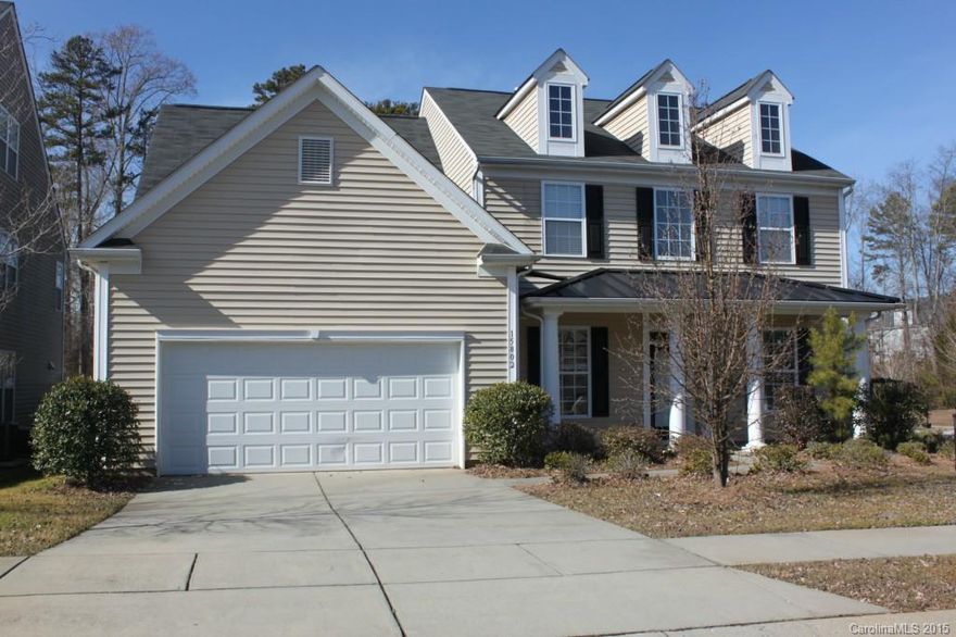 Stunning 5BR,3.5 BA house with inviting  front porch w/columns.  Beautiful kitchen with cherry cabinets and stainless steel appliances, brand new Stainless steel side by side refrigerator. Two story great room with lots of windows. The breakfast area has french doors leading out to a sunroom. Master bedroom has trey ceiling, built in shelves in walk in closet. heavy moldings and wainscoting, level backyard