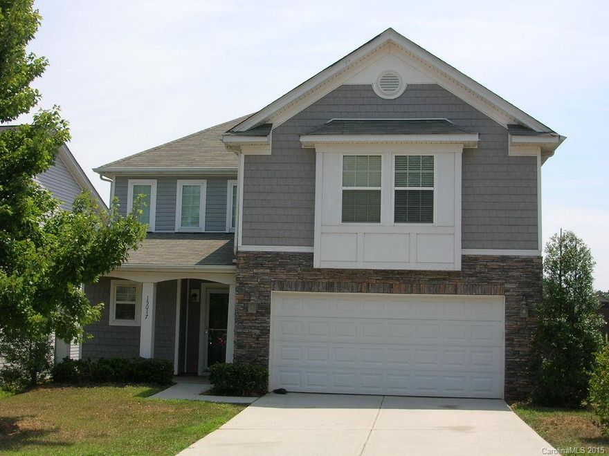 Exceptional home in one of Charlotte's most rapidly-developing areas. Completely updated with new carpet, paint throughout, deck staining and cleaning. Great floor plan with plenty of room on main level for gatherings and 3 spacious bedrooms upstairs. Large rear deck expands space to the outdoors overlooking a great yard and view of the lake. This one is a must-see for any buyer looking in SW Charlotte. It will impress!!