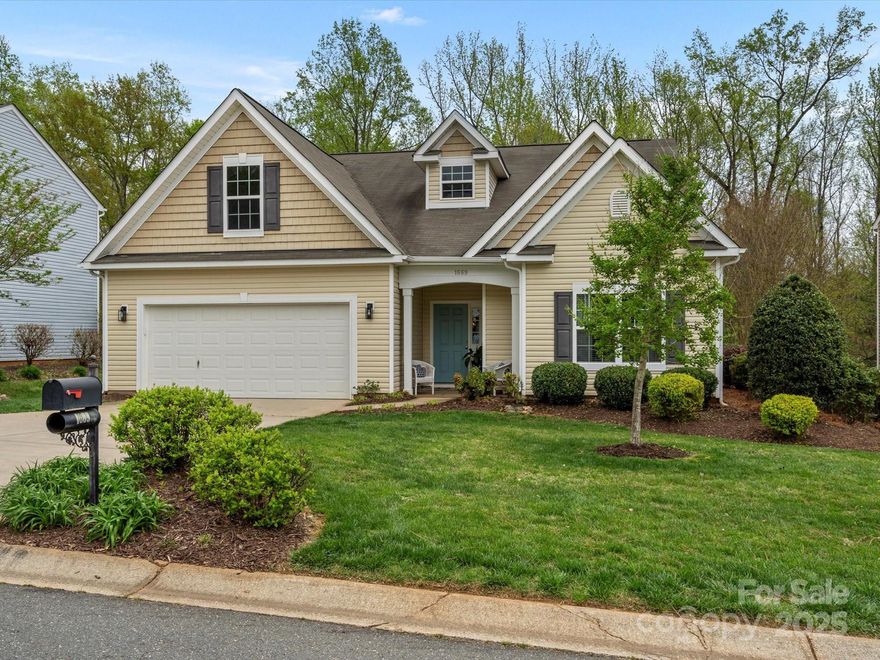 Welcome home to 1669 Beleek Ridge Lane, this meticulously cared for ranch home is ready for its new owners! Over the threshold you will see an inviting open floor plan lined with gorgeous hardwood floors and vaulted ceilings! The open living room, dining room and kitchen are perfect places to entertain your family and friends! Enjoy creating your favorite dishes in the large kitchen that has an abundance of cabinet and counter space! Sip your tea or coffee in the breakfast area that overlooks your private back deck and yard!  The primary suite and bath are ready for rest and relaxation! Two more bedrooms, full bath and laundry room finish off the interior features!  Beyond the glass you will find a professionally manicured lawn and expansive deck with awning cover! Mill Creek Falls amenities that are offered include tennis courts, a pool, walking trails, disc golf, a pond, picnic area, playground & community center! All located in the award winning Clover School district!