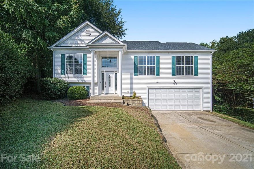 This Charlotte two-story cul-de-sac home offers a two-car garage.