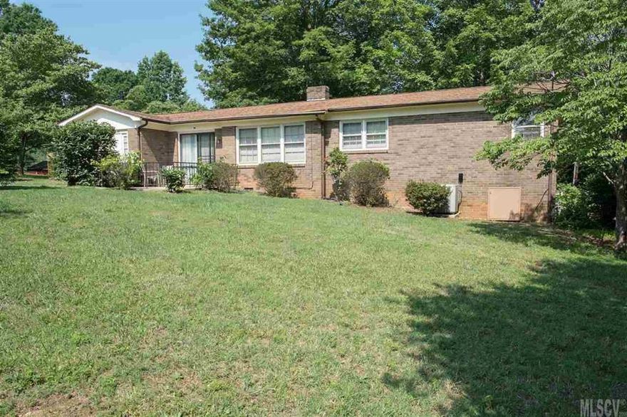 Well maintained brick ranch on corner lot.  Nice, private yard.  Almost 1600 square feet heated.  This house has great bones...needs cosmetic updating.  Seller will offer home warranty.  Larger lots than most in this downtown area.