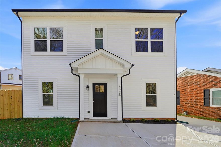 Move in ready package included - 6' wooden privacy fence, washer, dryer, refrigerator & blinds! 100% financing & $10,000 in closing costs subject to credit and income qualifying or Builder/Lender 2-1 Rate Buy Down! (rates in the 4's). Stunning new construction 3 bed 2.5 bath single family home with office or 4th bedroom located in Downtown Mooresville! Open floor plan featuring 9 foot ceilings on both levels and luxurious finishes such as quartz countertops, white shaker cabinetry with 42" uppers, soft close doors & dovetail drawers, tiled kitchen backsplash, designer tile in both primary and guest baths, and pendant lighting. Turnkey move in ready home perfect for first time buyers and investors. Loaded with upgrades including white oak luxury vinyl plank flooring, Pella windows & doors, GE stainless steel appliance package, Moen plumbing fixtures and black hardware. Primary suite offers a dual vanity and walk-in shower. Complete with ample parking and fenced in flat yard. No HOA or rental restrictions, can be used for short term, mid term or long term rental. Pack your bags because this one is move in ready!