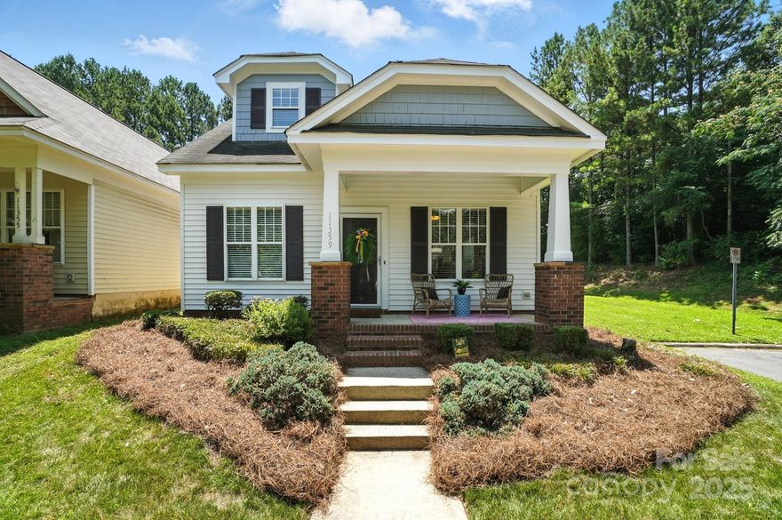 Welcome to this beautifully maintained Saussy Burbank home nestled in the highly sought after Ballantyne area.  Sitting on a desirable end lot,this 1.5 story home blends timeless character w/modern upgrades,offering the perfect combination of comfort,style and location.Relax on the inviting rocking chair front porch,then step inside to find stunning LVP flooring, high ceilings and elegant crown molding throughout the light-filled main level. The updated kitchen features new stainless steel appliances and a spacious, open layout,perfect for entertaining.Two generously sized bedrooms w/full updated bath complete the main floor. Upstairs, the grand primary suite offers a walk-in closet and private en-suite bath, creating a true retreat! HVAC 2024! Water heater 2025! Enjoy tree-lined streets, top-rated schools, it's close proximity to I-485, I-77 and the exciting new Ballantyne Bowl. Don’t miss your chance to own this exceptional home in one of Charlotte’s most desirable neighborhoods!