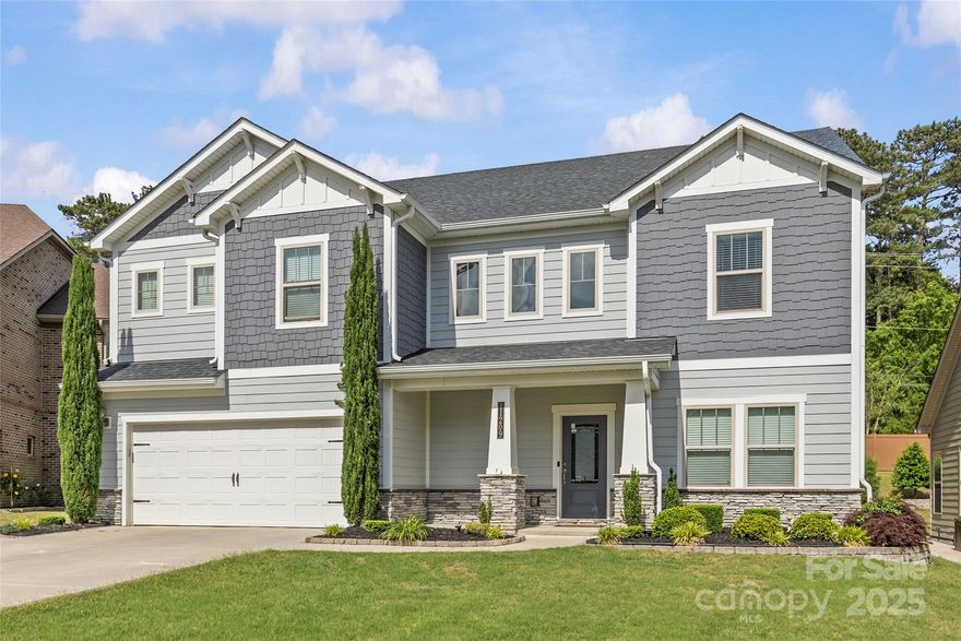 Welcome to this modern Craftsman-style, energy-efficient home in prime Ballantyne. With 5 beds, 4.5 baths, and 3,496 sq ft, this luxurious residence offers a two-story great room with stone fireplace, gourmet kitchen with gas cooktop and granite counters, and a first-floor guest suite. Enjoy the serene covered patio and professionally landscaped backyard. Foam insulation throughout ensures quiet comfort and significant energy savings. Located near Ballantyne, SouthPark, and top-rated Ardrey Kell High School. A must-see for families seeking luxury living in a premier location!