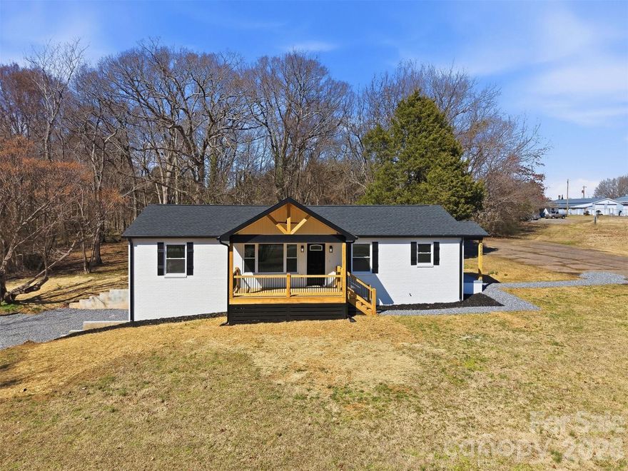 This fully renovated brick home offers the rare combination of timeless structure and modern upgrades. Featuring 3 bedrooms, 2 baths, and a full basement, nearly every major component has been replaced: new roof, electrical, plumbing, windows, insulation, flooring, and more.
The kitchen shines with new granite countertops and custom cabinetry, flowing into refreshed living spaces filled with natural light. Situated on almost a full acre of flat land, this property offers space, privacy, and versatility — all complemented by a large covered front porch perfect for morning coffee or evening relaxation.

Conveniently located with quick access to Highway 40, downtown Claremont, local schools, and dining, you truly get the best of both convenience and comfort.

This home offers the character of an established brick home with the feel of brand-new construction. Move-in ready and built to last — don’t miss this opportunity! Schedule your showing today!