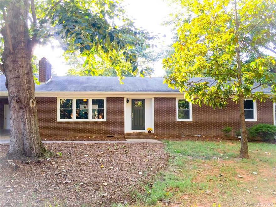 Renovated FULL brick home! MORE UPGRADES THAN A NEW BUILD! Open Concept! New kitchen cabinets, stainless steel appliances, granite counters and large butcher block island with bar seating! New Moen bath fixtures with custom tile shower surround and tile floors in both baths! Hickory laminate flooring throughout common area. New Stainmaster carpet in all bedrooms! New HVAC unit! HUGE covered back deck and a private fenced backyard! Brick Fireplace! This is a must see! MOVE IN READY!