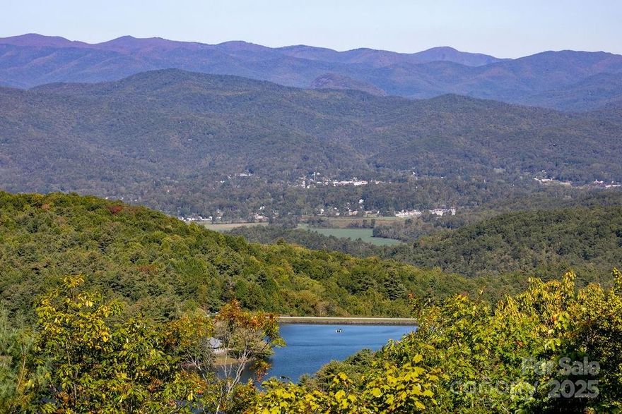 Rare and remarkable opportunity in the highly sought-after Eagle Lake community—this 6.98± acre tract offers breathtaking long-range mountain and lake views unlike anything else on the market. The owner is in the process of reverting the property to its original configuration, consisting of two individual lots, which can be offered separately or as one magnificent estate parcel. The land provides exceptional potential—create a private mountain retreat or develop two distinguished homesites, each with sweeping vistas and serene surroundings.

Eagle Lake is renowned for its tranquil atmosphere, scenic beauty, and private 32-acre lake, ideal for kayaking, fishing, or simply immersing oneself in the peaceful mountain surroundings. Just minutes from downtown Brevard, you’ll enjoy the charm of this vibrant mountain town along with quick access to Pisgah National Forest, DuPont State Forest, and the Blue Ridge Parkway—offering world-class hiking, biking, waterfalls, and outdoor adventure. Experience all four seasons in this premier Western North Carolina destination, ideally situated near both Hendersonville and Asheville.
