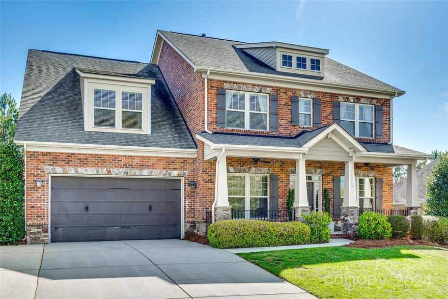 Welcome to this stunning full brick home located in the sought-after neighborhood of Barber Rock in Indian Land, SC. Upon arrival, you are greeted by a charming rocking chair front porch, perfect for enjoying your morning coffee or relaxing in the evening. Entering the home you will notice the hand-scraped flooring, dedicated office space & formal dining room. The open floor plan features a spacious living room with stone fireplace. The kitchen has a large island, ample counter & cabinet space & SS appliances. Upstairs features 4 bedrooms plus a 5th bedroom/bonus room. The primary bedroom is spacious & the primary bathroom features a separate shower & tub, dual vanities & leads to a large walk in closet. Outside, you will love the screened porch & the large patio is the perfect spot for grilling and entertaining. This home has solar panels that nearly eliminates the power bill & a home water filtration system. The Barber Rock community has an outdoor pool, clubhouse & playground.